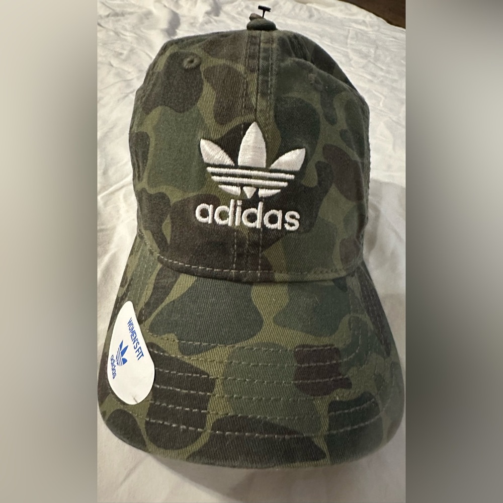 Women’s Adidas camo colored hat.